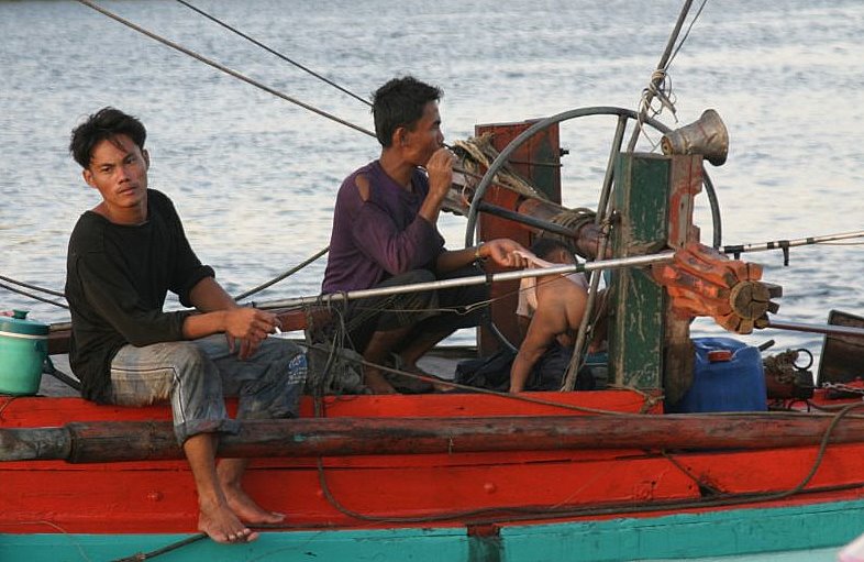 Fishermen and family