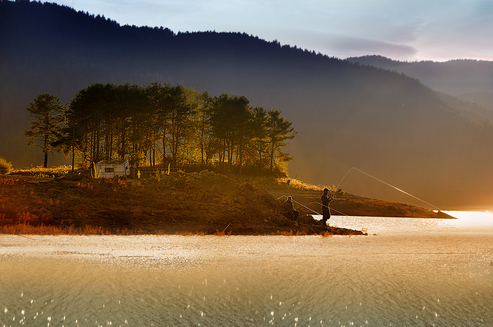 Fishermen at sunset