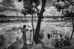 Fishing at Neak Pean