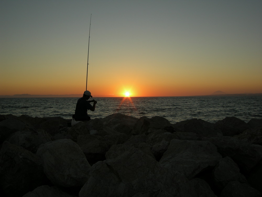 fishing at sunrise