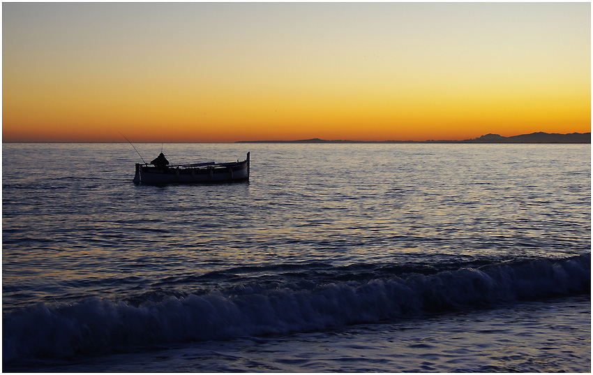 Fishing at sunset