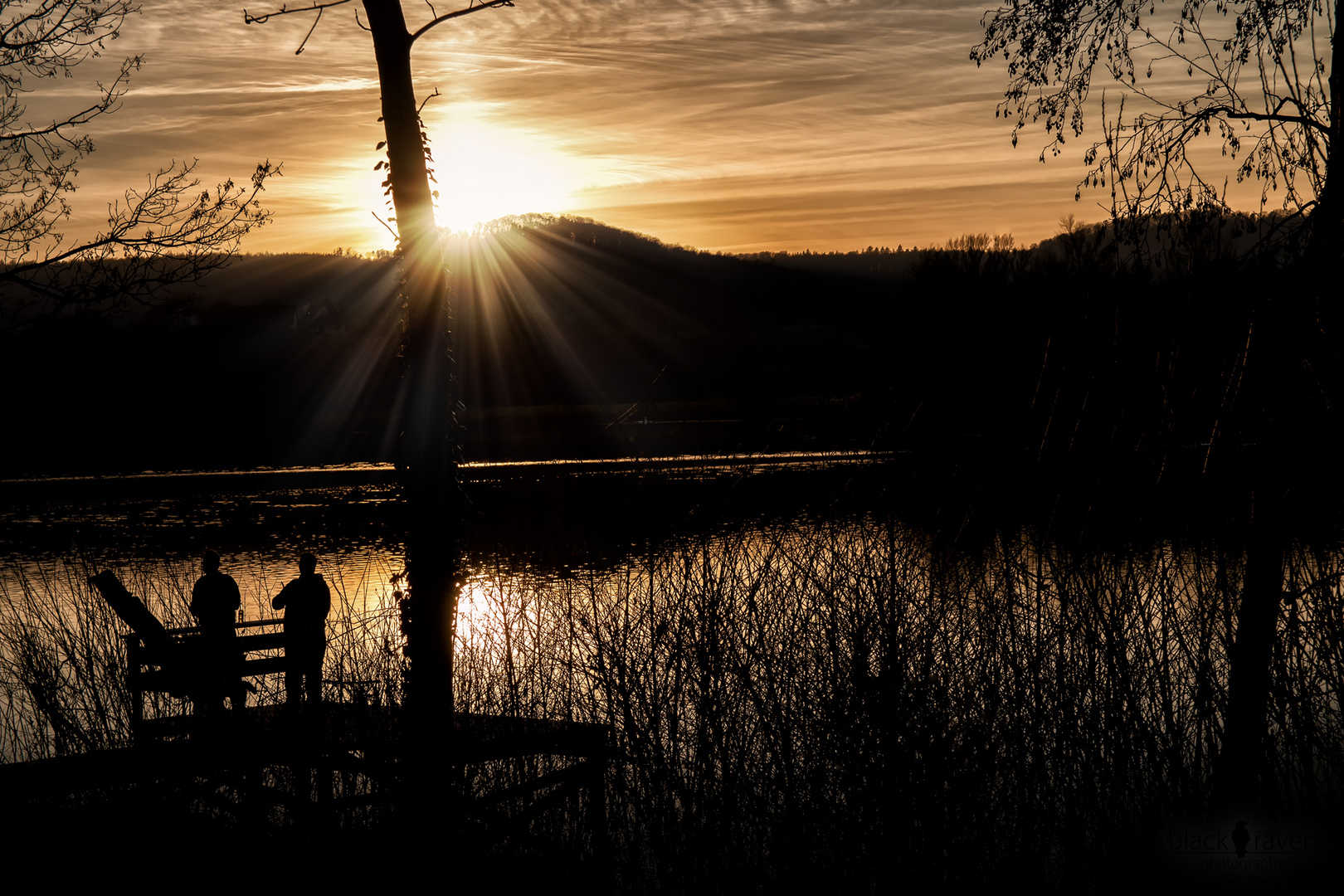 fishing at sunset lake