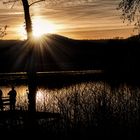 fishing at sunset lake