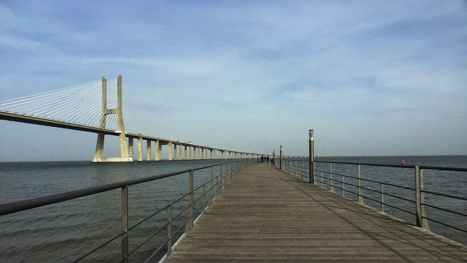 Fishing at Vasco da Gama bridge Lisbon