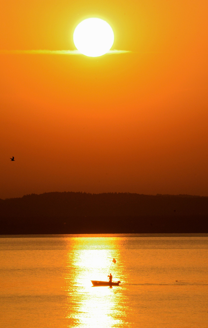 Fishing boat at sunrise