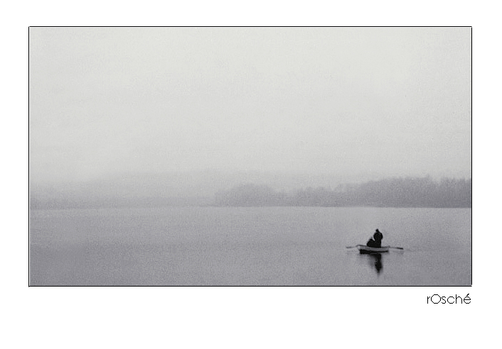 Fishing boat on a foggy day