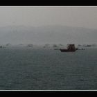 fishing boats in a rainy day