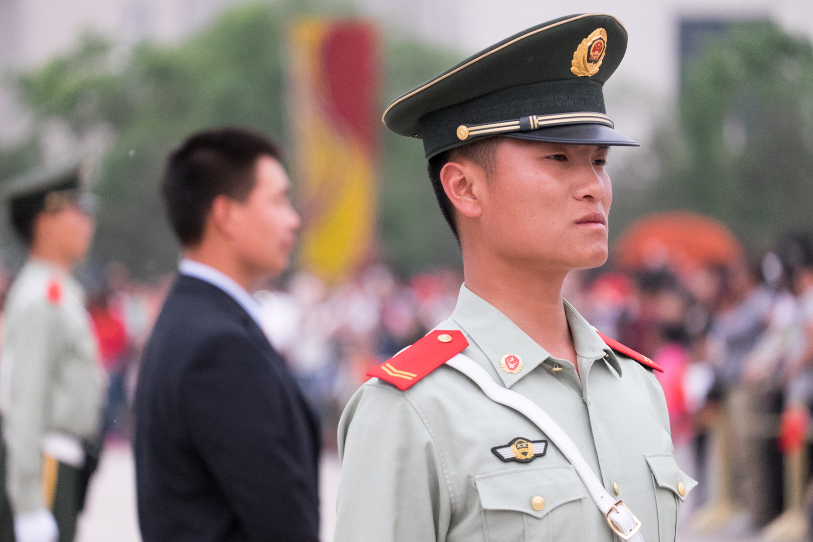 Flaggenparade am Tien an Men Platz