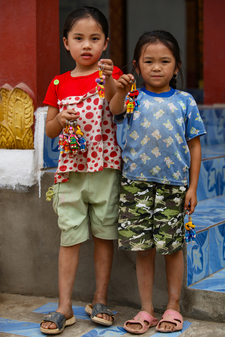 Fleißige Verkäuferinnen in Luang Prabang