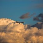 Flieger im Wolkenbett