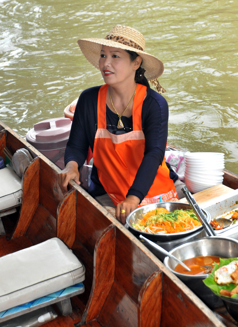 Floating market woman, Thailand