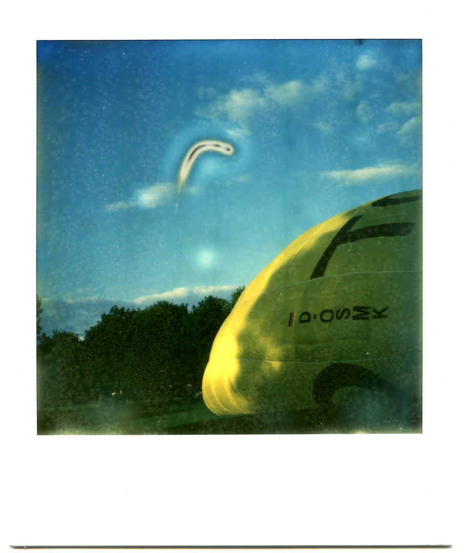floppy yellow balloon with unidentified banana-shaped flying object