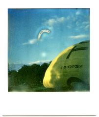 floppy yellow balloon with unidentified banana-shaped flying object