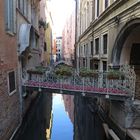 flowerrs over a Venetian streetwerr