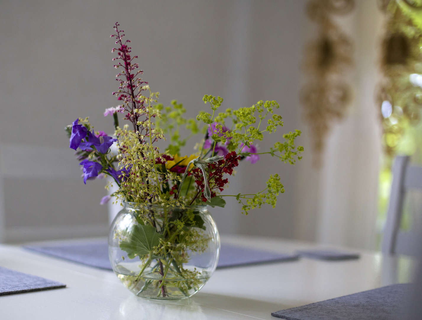 flowers in a vase on the table