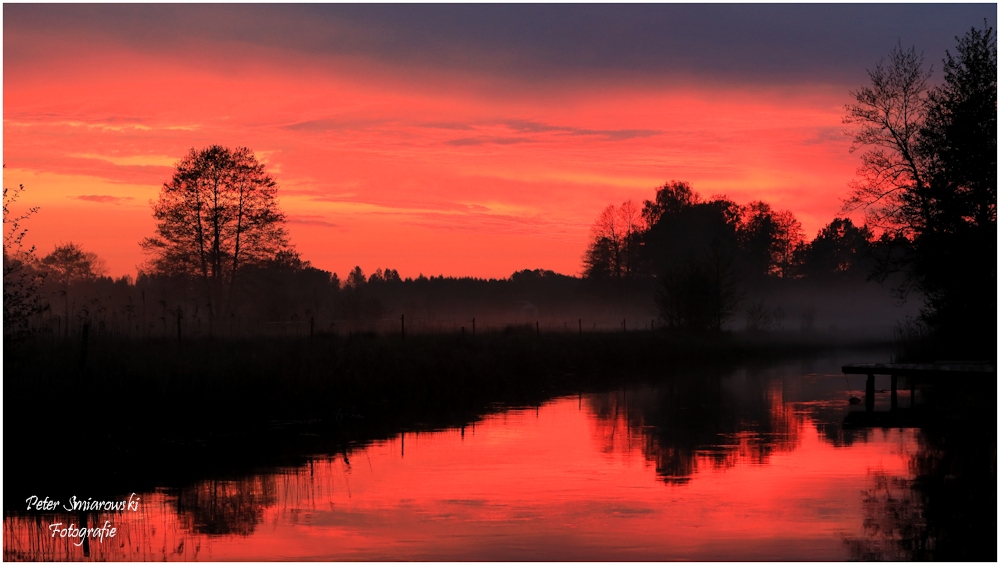 Flußlandschaft nach Sonnenuntergang