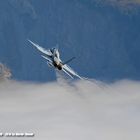 Flying over the foggy valley