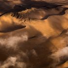 Fog rolling in over the Namib Desert