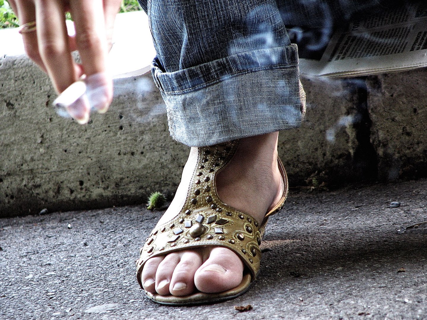 Foot and a Hand with a Cigarette