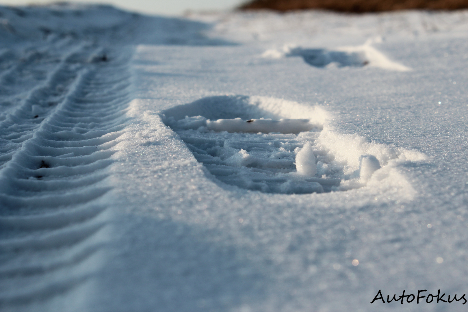 Footsteps.