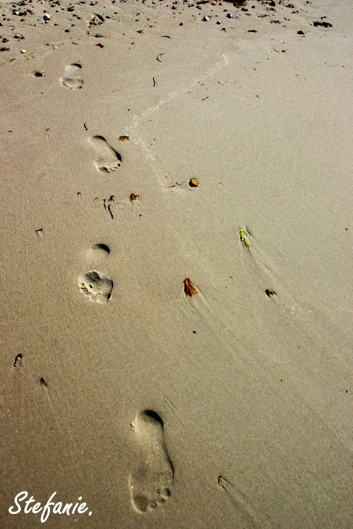 Footsteps.