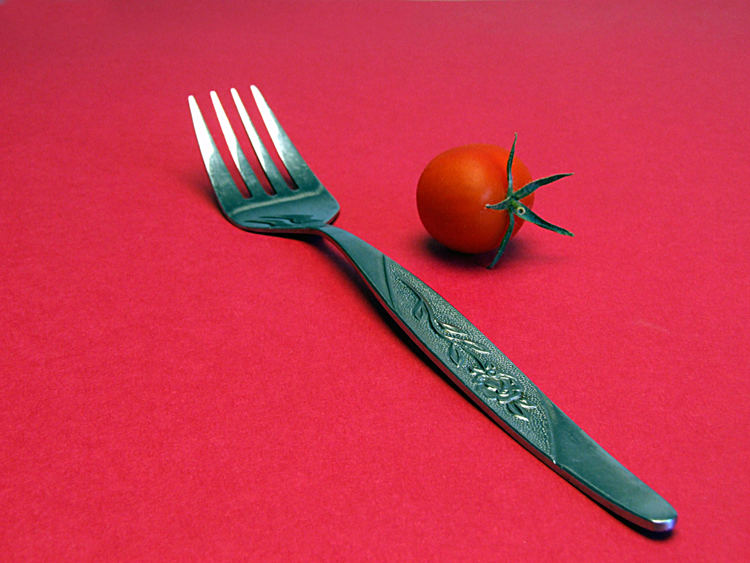 fork and tomato