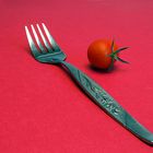 fork and tomato