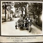 Foto: Altes Motorrad mit Beiwagen