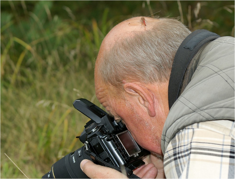 Fotograf beim Fotografieren....