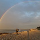 Fotograf beim Regenbogen fotografieren an der Ostsee