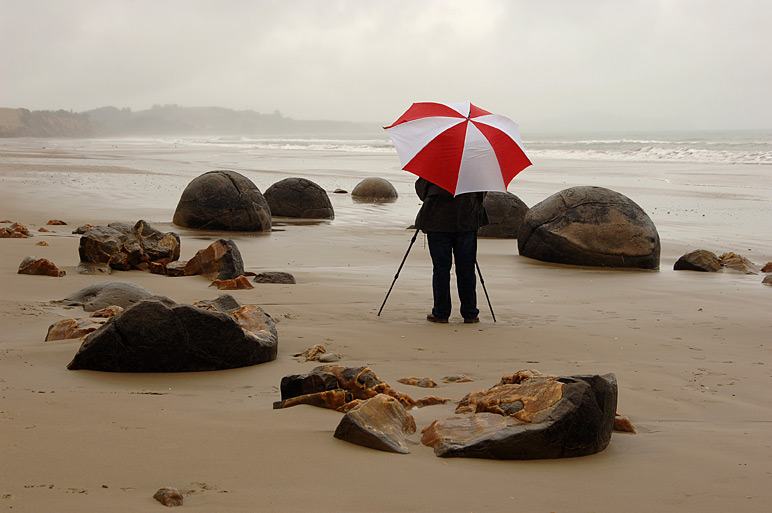 Fotograf im Regen