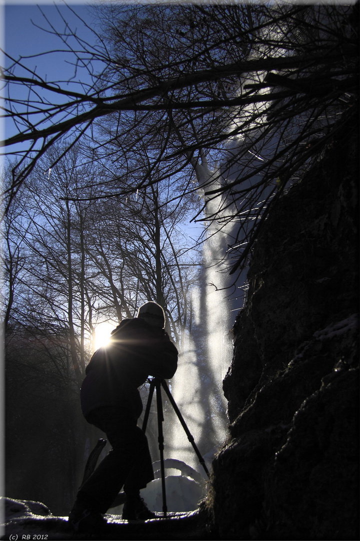 Fotograf(in) bei der Arbeit