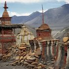 Four chorten on the track