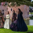 Four ladies in front of the castle