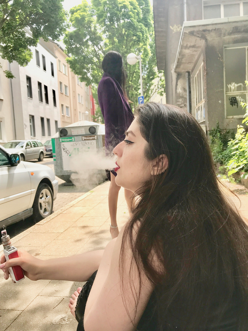 Foxy vaping in another street