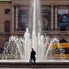 Frau am Brunnen