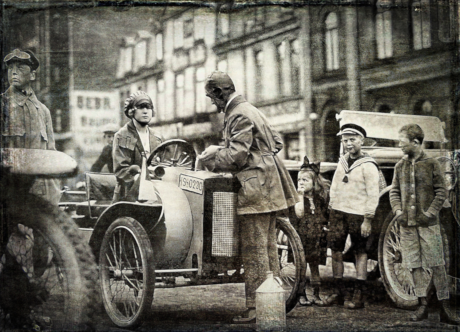 Frau am Steuer - und das um 1910  .. ??!