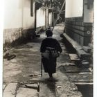 Frau der Naxi in Lijiang, China