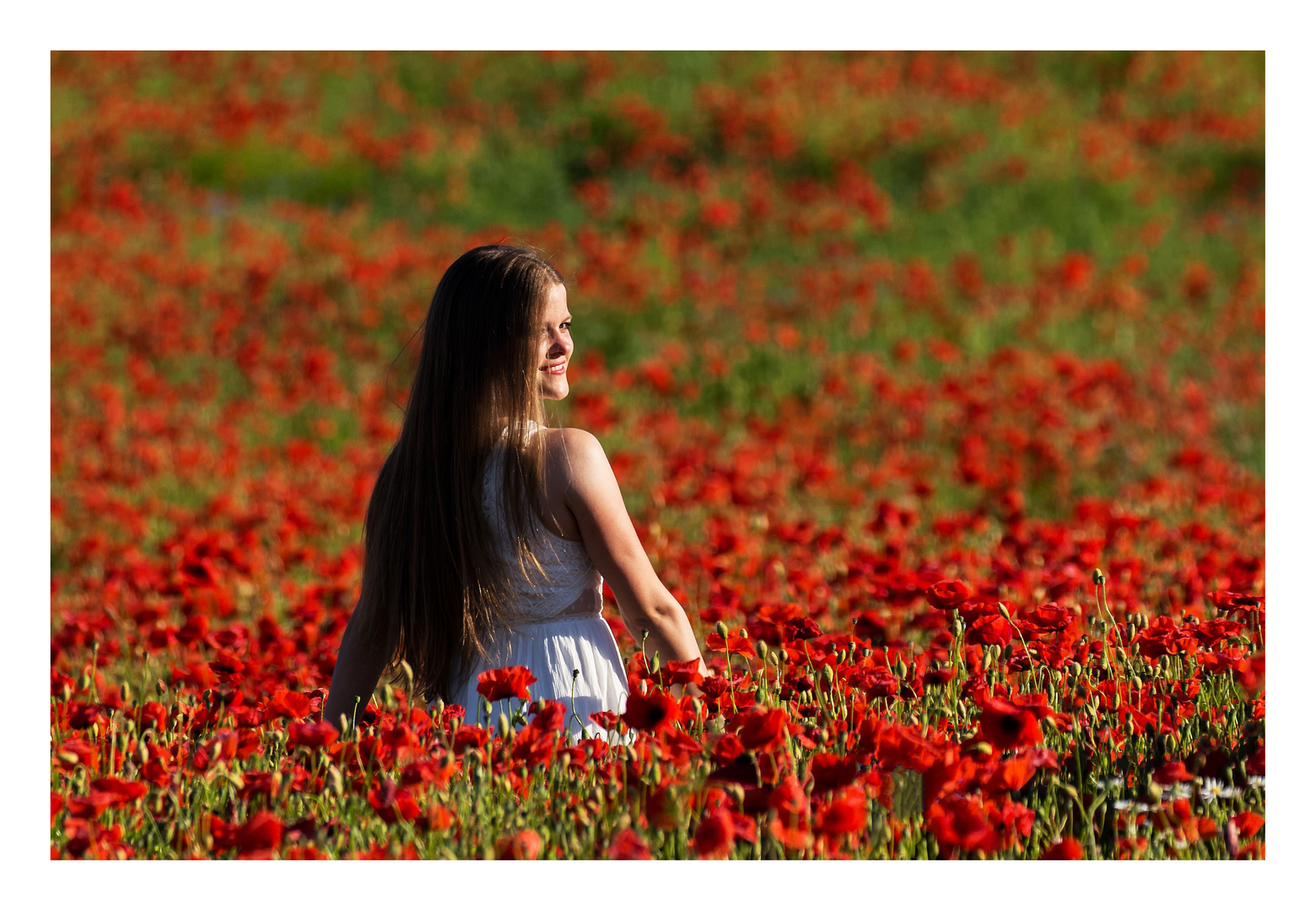 Frau im Mohn