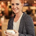 freckled beauty in a coffee shop