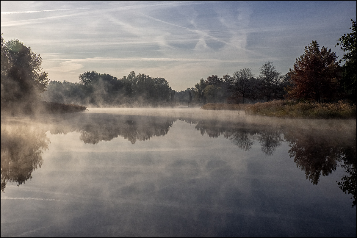 Frost, Nebel und aufgehende Sonne