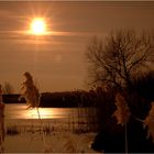 Frozen Lake in Winter Sunset