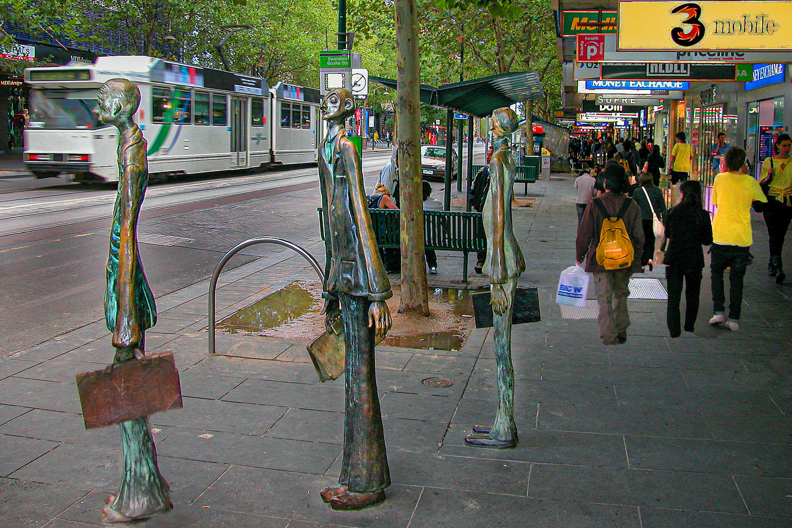 Frozen pedestrians in Queen St