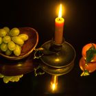Früchte mit Kerzenlicht