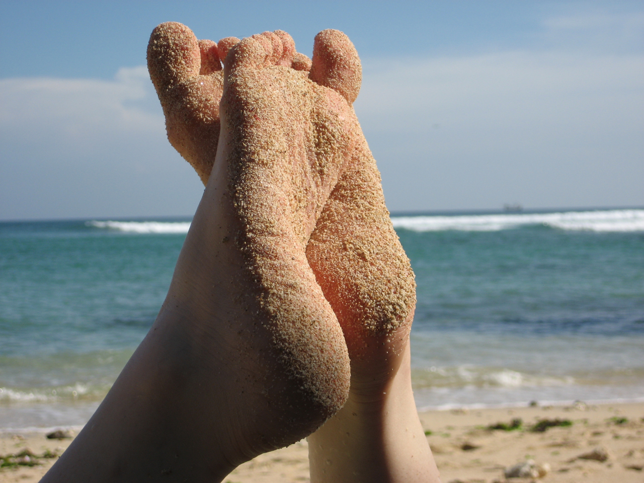 Füße am Strand