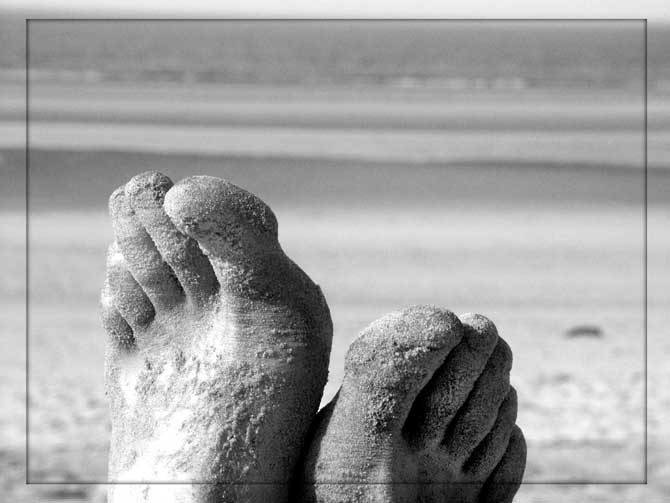 Füße am Strand von Wangerooge