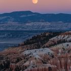 full moon at sunset