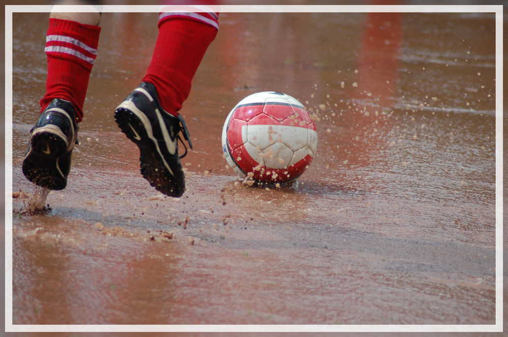 Fußball bei Regen