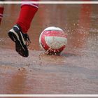 Fußball bei Regen