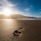 Fußspuren am Strand